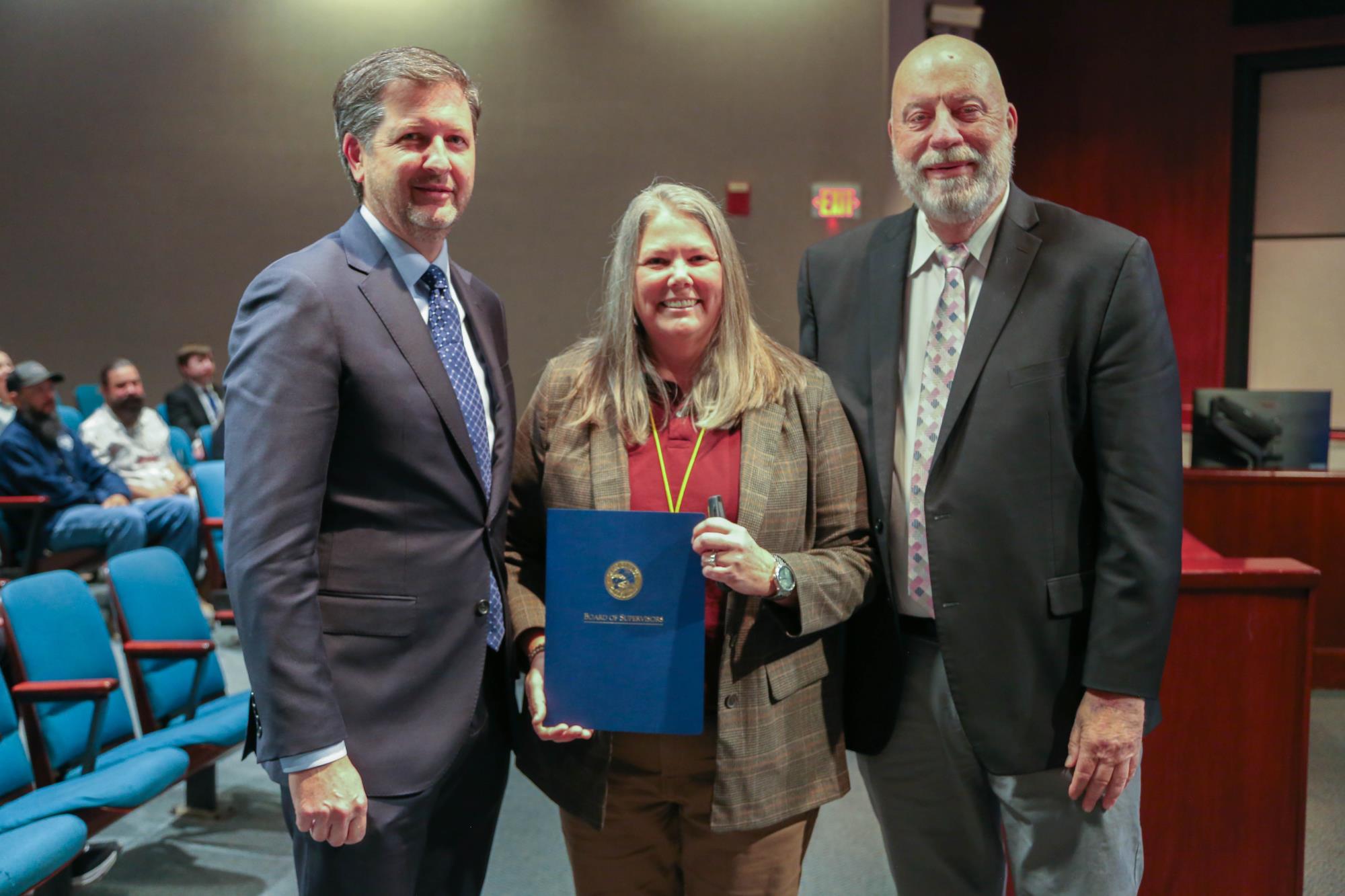 Board of Supervisors proclaiming Public Works Week. Picture of Supervisor Couch and Joshua Champlain, Public Works Director, and Michelle Burns-Lusich, Chief General Services Officer