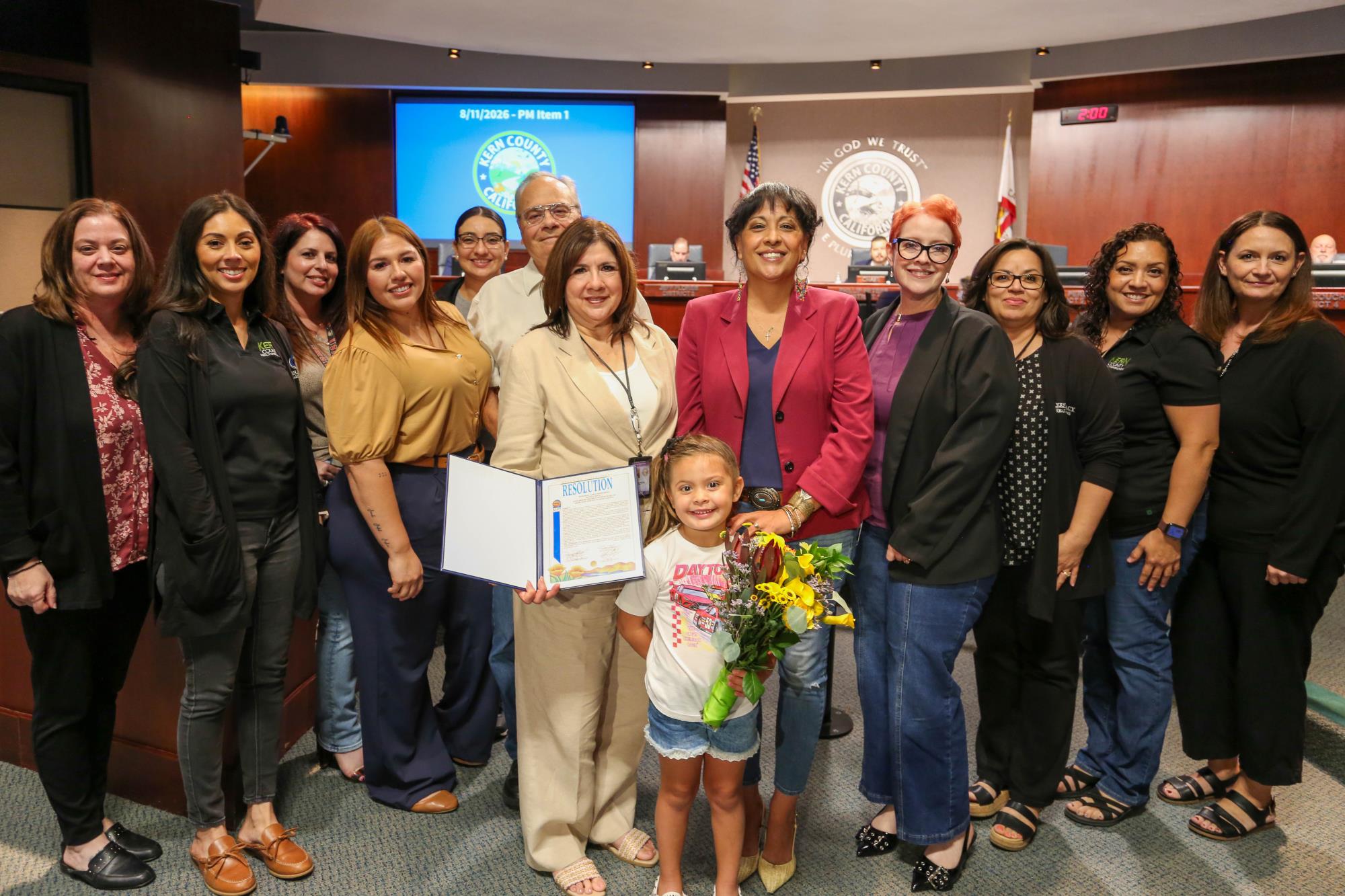Photo of board recognizing Human Resources Employee Monica Molica on her retirement and 36 years of dedicated service to Kern County